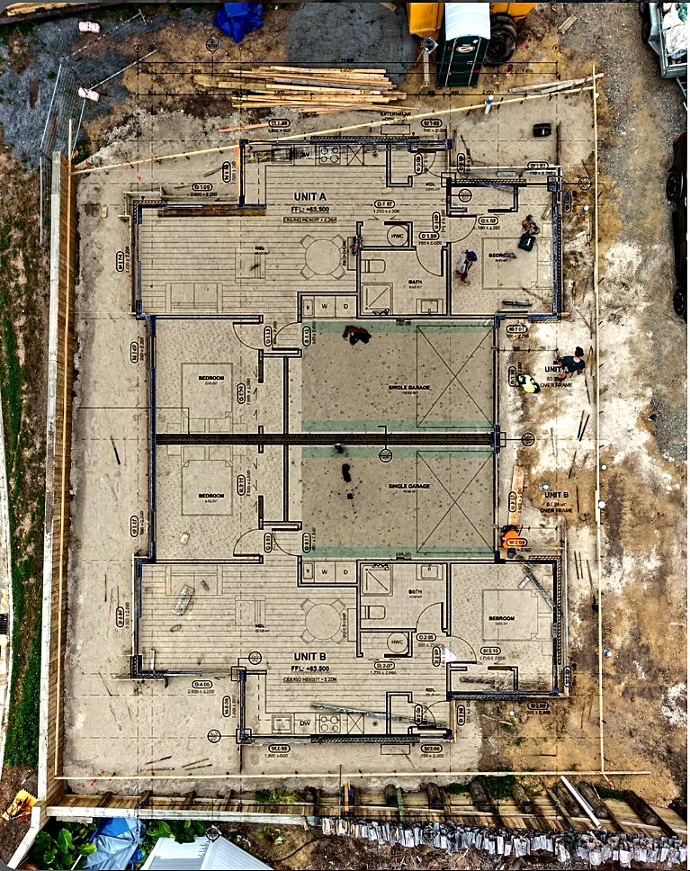 Drone view of a TAG slab on site with the floor plan overlaid